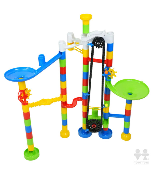 Marbulous AutoRun chain elevator marble run with rainbow striped posts, studio shot on white
