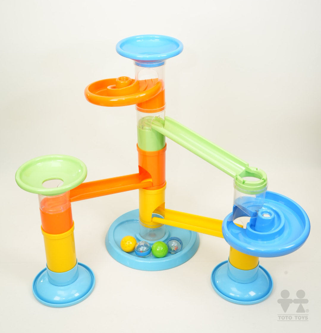 Rollipop Deluxe mega set on white with five marbles gathered in the blue base tray